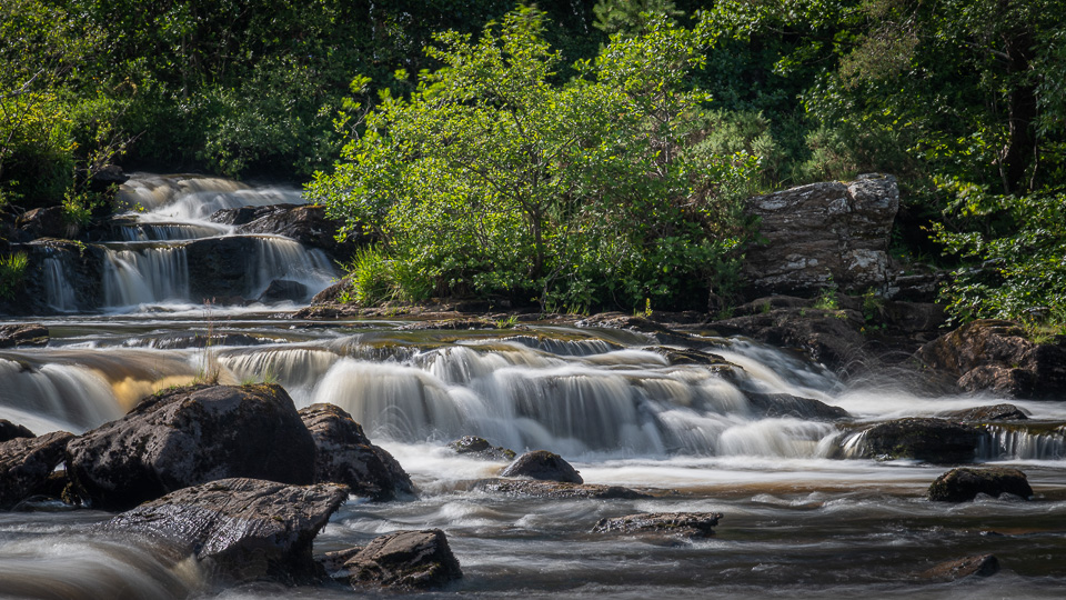 A photograph of part of the Falls of Dochart